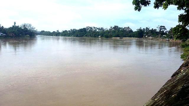 Debit Air Sungai Kuantan Naik, Warga Diminta Waspada